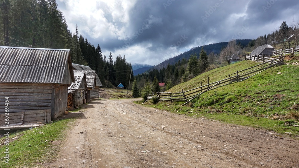 Small houses in a village in the Carpathian Mountains. Small houses in a village in the Carpathian Mountains.