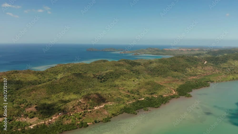Aerial drone small island group in province of Palawan. Busuanga, Philippines. Seascape, islands covered with forest, sea with blue water. tropical landscape, travel concept Aerial drone small island group in province of Palawan. Busuanga, Philippines. Seascape, islands covered with forest, sea with blue water. tropical landscape, travel concept