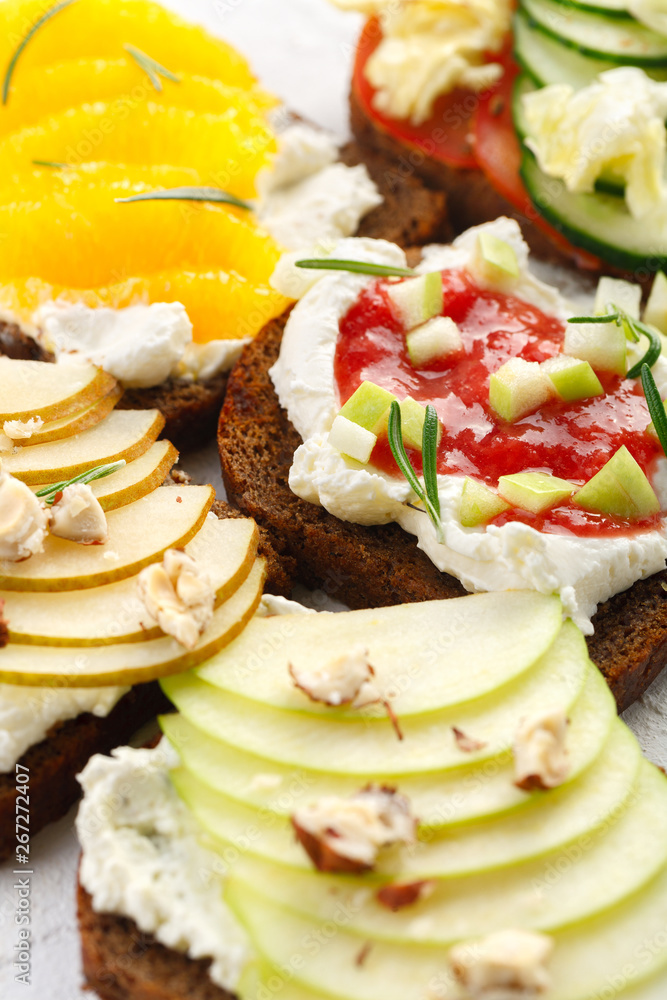 Healthy breakfast. bruschetta with fruit, cheese and nuts. A Banquet snack. Healthy breakfast. bruschetta with fruit, cheese and nuts. A Banquet snack.