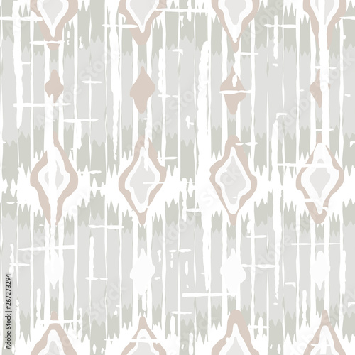 Ikat pattern vector. Geometric background with ethnic rug fabric texture and chevron shapes in neutral pastel colors.