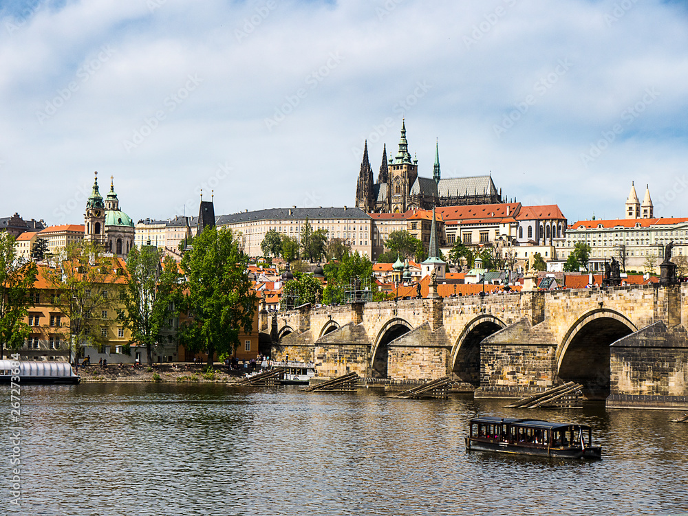 the River Vltava flows through the city of Prague