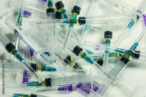 Syringe with needle, used syringes