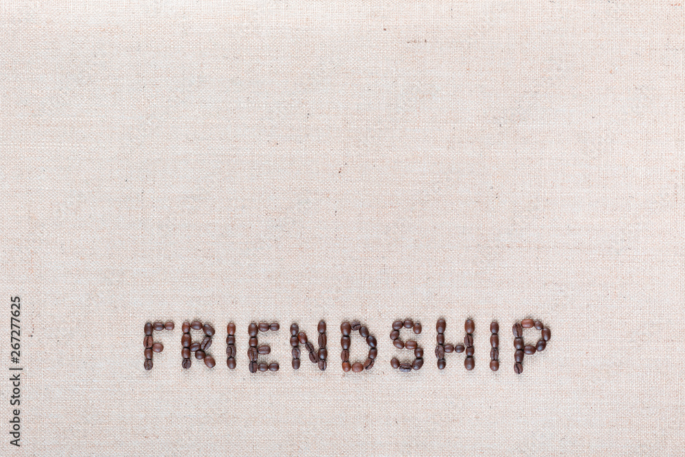 Friendship word written with coffee beans, aligned at the bottom. Friendship word written with coffee beans, aligned at the bottom.