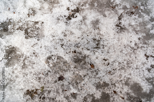 Dirty snow with footprints © savelov