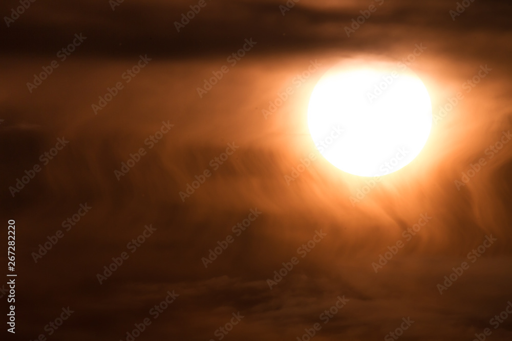 yellow sunset clouds in front of hot sun pattern texture yellow sunset clouds in front of hot sun pattern texture