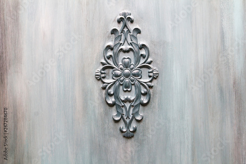 Moulding element from gypsum on wall texture blue color. Rococo romantic style