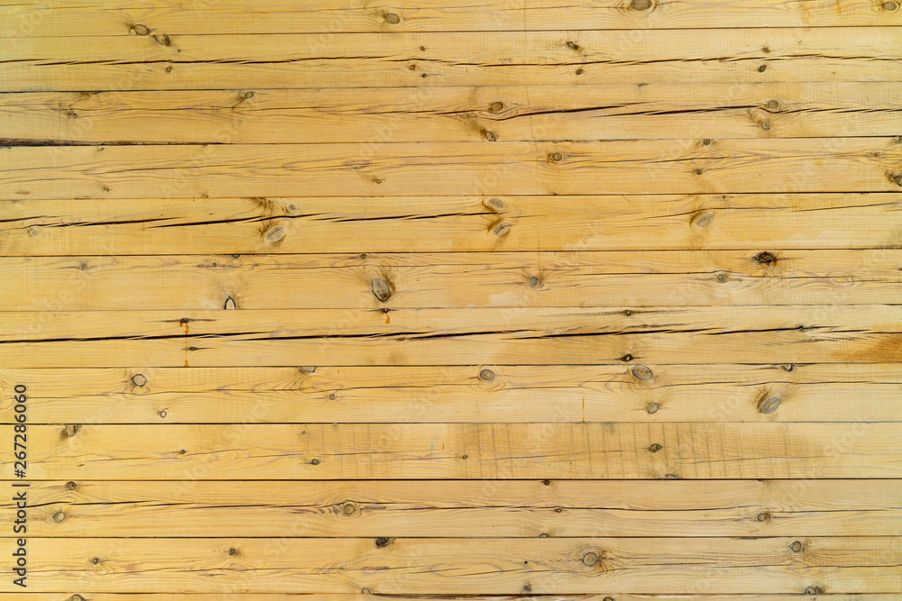 Fototapeta premium Background from yellow wooden boards