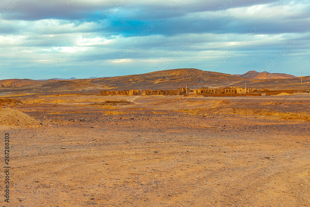 Black stoned desert in Merzouga Sahara near Erg Chebbi, Morocco in Africa