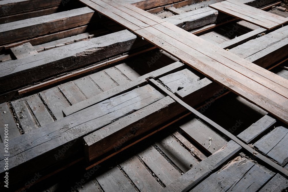 old wooden floor beam and plank construction in attic loft - old wooden floor beam and plank construction in attic loft -