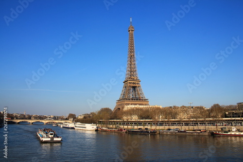 Beautiful sky over the Eiffel tower and river seine, Paris capital and the most populous city of France © Picturereflex