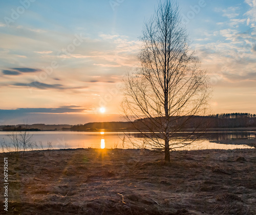 Early spring. Beautiful sunset on the wild nature. Forest river © Антон Ямщиков