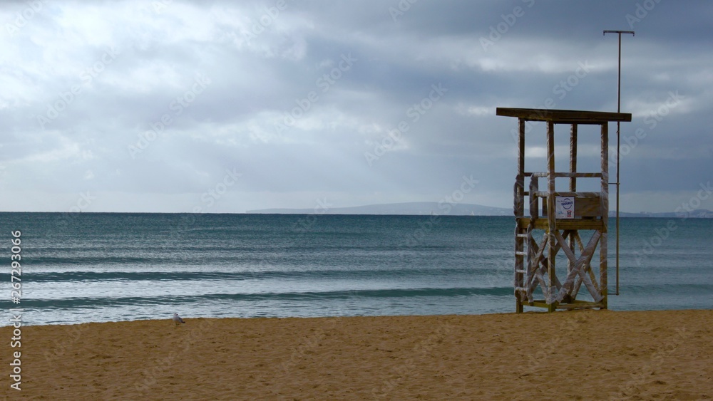Watchtower on the sandy beach shore Watchtower on the sandy beach shore