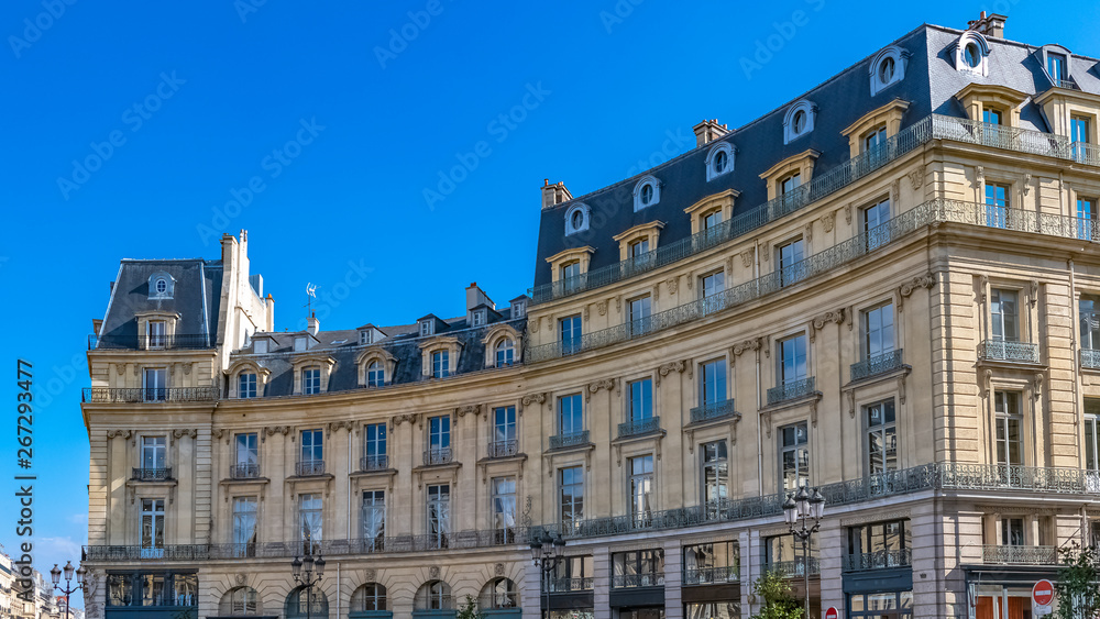      Paris, the place des Victoires, typical parisian facades and windows 
