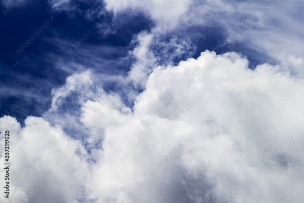 Fototapeta premium Blue sky background with white clouds