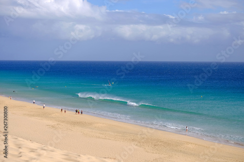 View from above on beach with golden sand and ocean in Morro Jable  Fuerteventura.