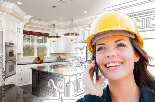 Female Contractor Using Cel...