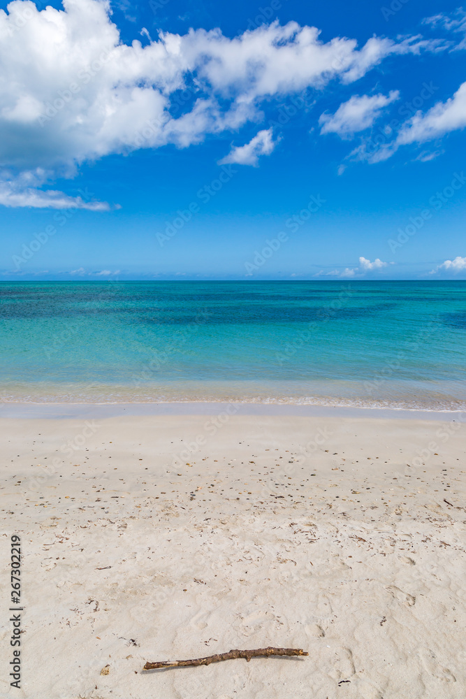 Looking out over the turquoise Caribbean Sea, with a blue sky overhead