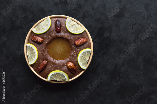 Saudi Arabia traditional dish Hineni, it is a mixed of dates and whole wheat. Ramadan food © sablinstanislav