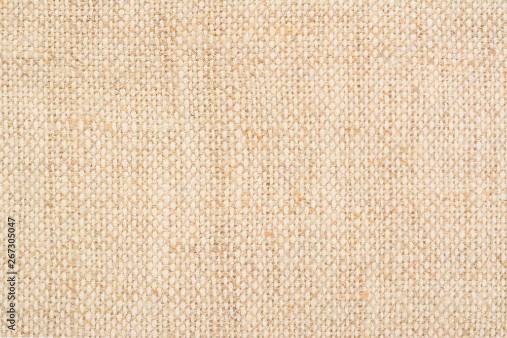 Homespun linen canvas background. Handmade linen fabric texture 0, close up. Homespun linen canvas background. Handmade linen fabric texture 0, close up.