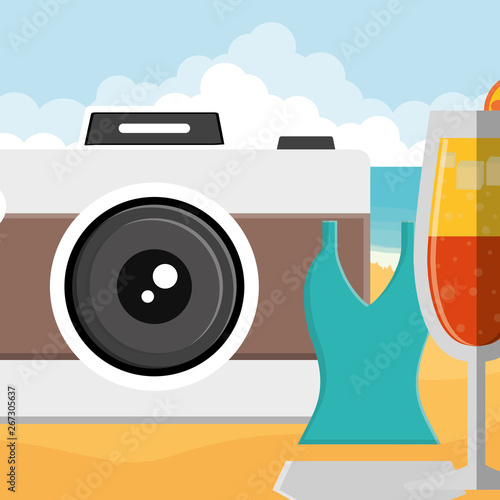 glass with tropical cocktail and swimsuit