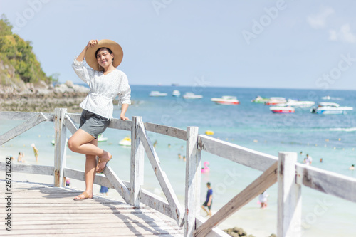 Young women traveling relax on the beach on summer, Concept beach on summer © Krizde
