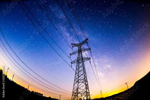 The outline of the power supply facilities and stars at night