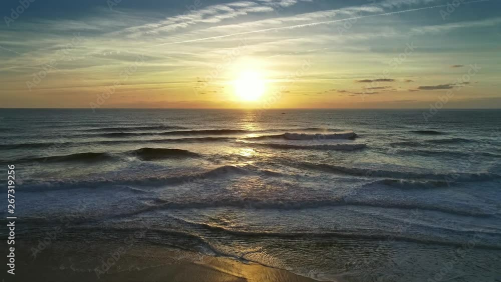 Aerial view on big waves of Atlantic ocean and sunset sun, 4k Aerial view on big waves of Atlantic ocean and sunset sun, 4k