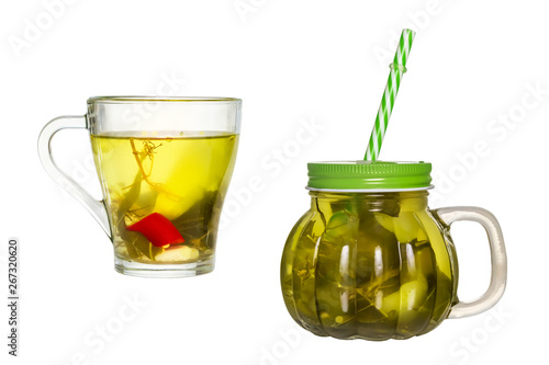 Two glasses with cucumber pickle isolated on white background