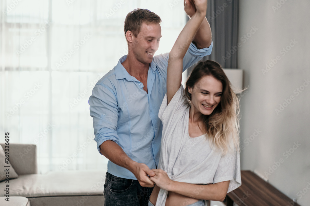 Intimate couple dancing at home. romance and love Intimate couple dancing at home. romance and love