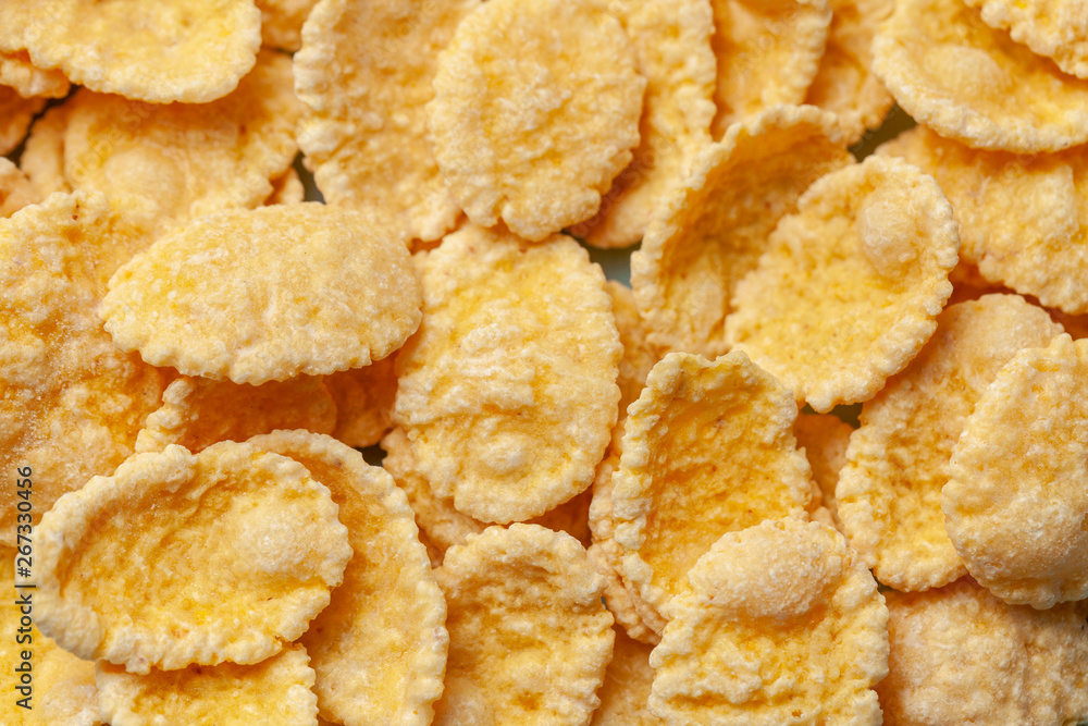Cornflakes dry breakfast. Yellow flakes texture closeup. Cornflakes dry breakfast. Yellow flakes texture closeup.