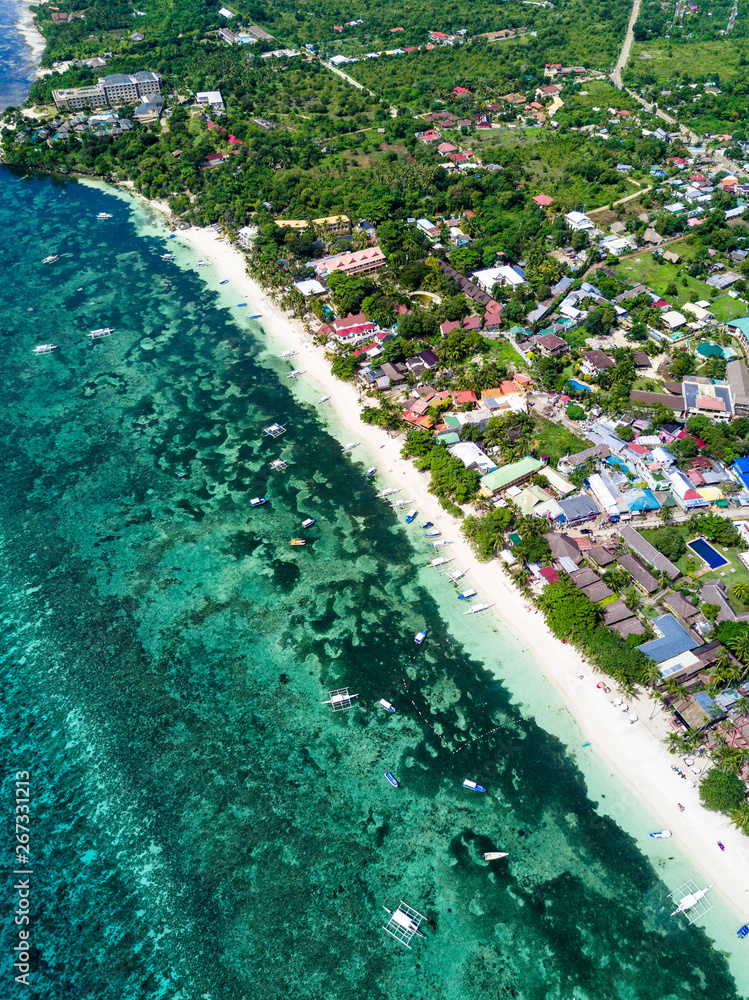 Aerial Drone Picture of the white sand Alona beach in Bohol, Panglao, Philippines