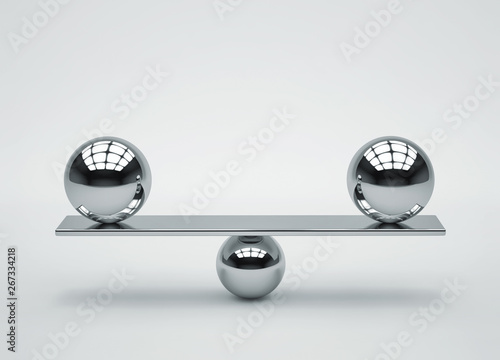 Balance concept. Composition of glossy metal spheres