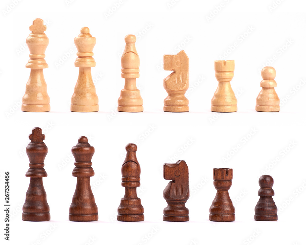 Set of black and white wooden chess figures standing isolated on white background Set of black and white wooden chess figures standing isolated on white background