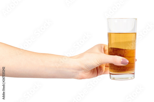 Hand with fresh apple juice in a glass, healthy beverage.