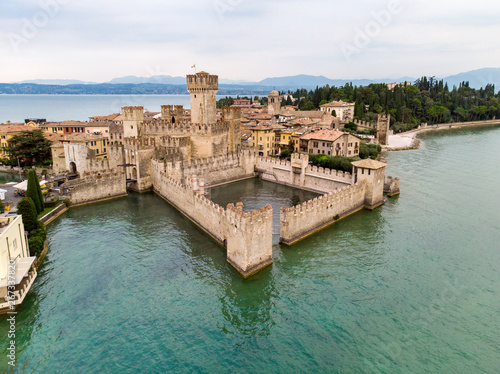 Aerial view of Sirmione, an ancient village on southern Garda Lake. Brescia province, Lombardy, Italy. September, 2018 photo