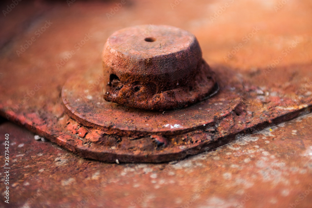 Rusty metal surface with round cover Rusty metal surface with round cover