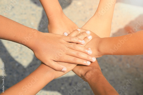 Handshake to combine unity power on a blurred background