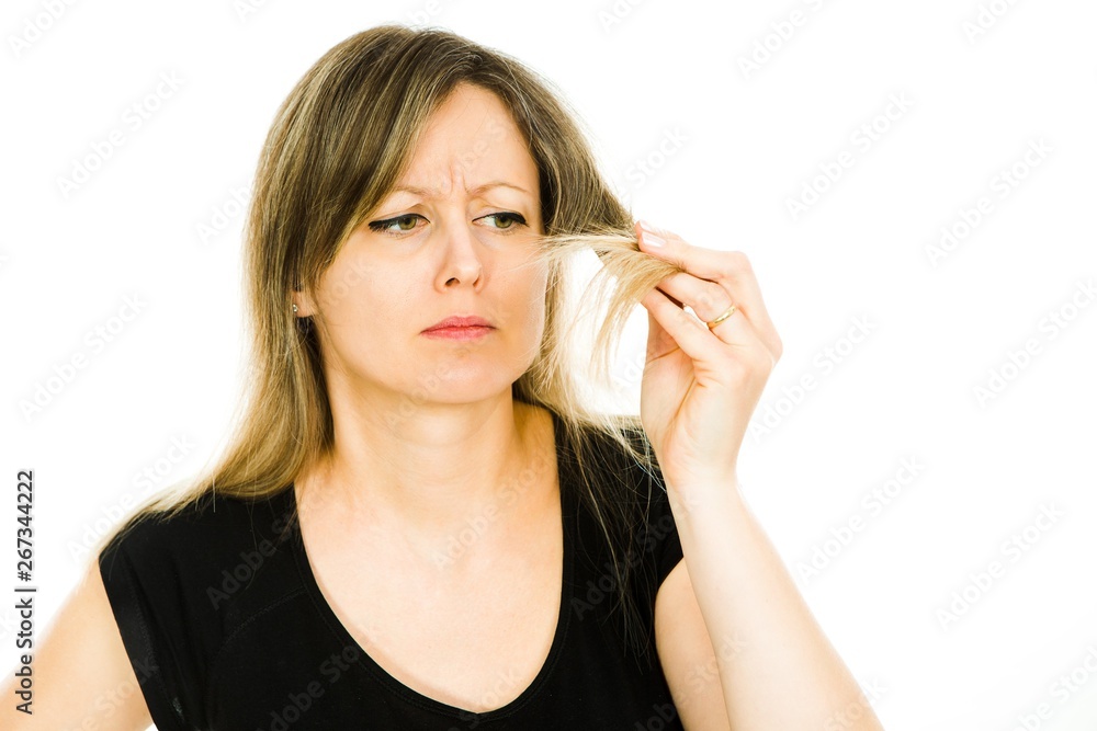 Blond woman - housewife - seeing problem with long straight hairs. Blond woman - housewife - seeing problem with long straight hairs.