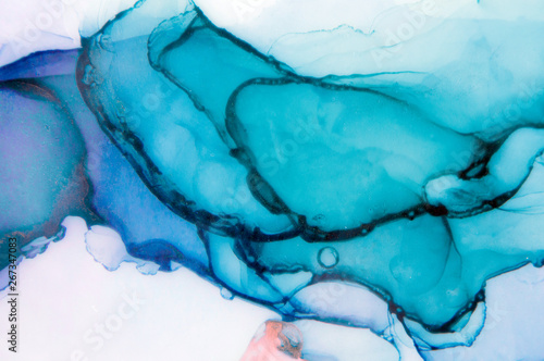 Alcohol ink sea texture. Contemporary art. Spots of oil paint. Abstract art background. Multicolored bright texture. Fragment of artwork. Modern art. Inspired by the sky, as well as steam and smoke.