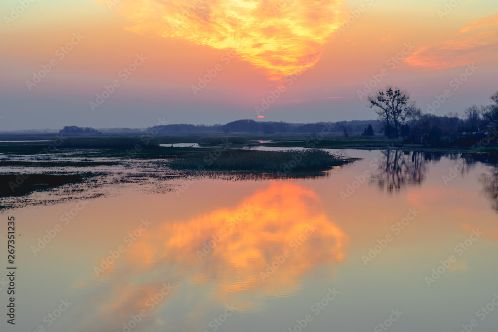 Fototapeta premium Biebrza Valley (Poland). Sunset over the meadows.