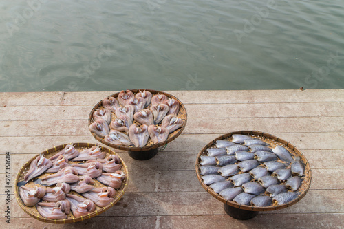 Wallpaper Mural Sun-dried fish made from Channa striata and Trichogaster pectoralis in the the three threshing basket Torontodigital.ca