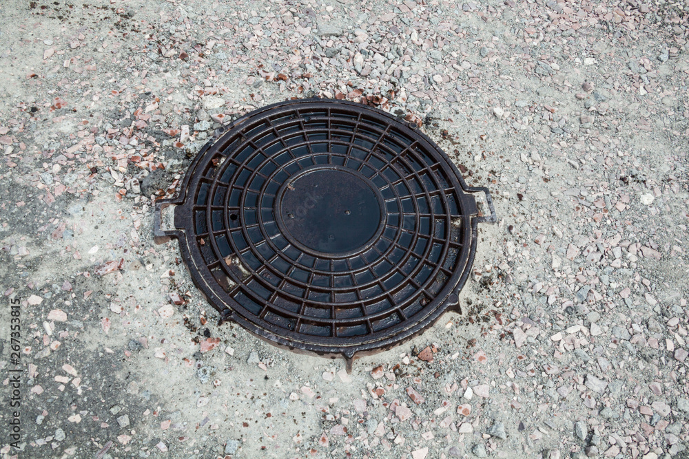 Manhole with metal cover