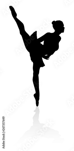 Ballet dancer woman in silhouette dancing in posed position