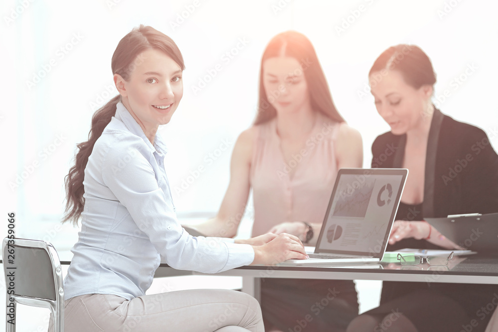 young business woman working with marketing data in office young business woman working with marketing data in office