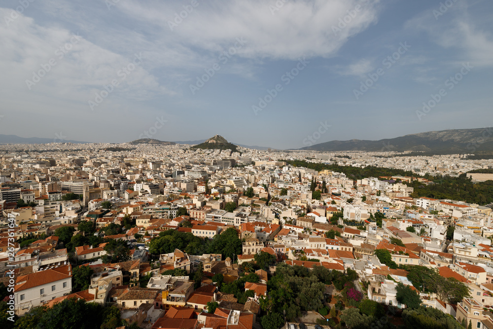 Panoramic view of the city of Athens and Mount Lycabettus as seen from the Acropolis of Athens during a summer afternoon (Athens, Greece, Europe)