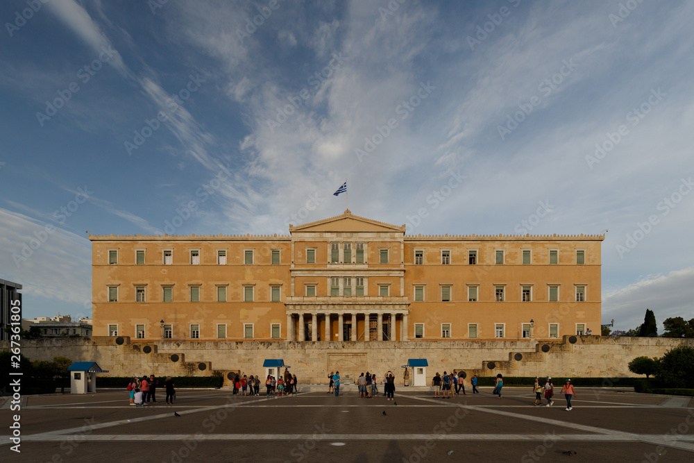 Athenian Syntagma square with the national Greek parliament building and its guards (Athens, Greece, Europe)