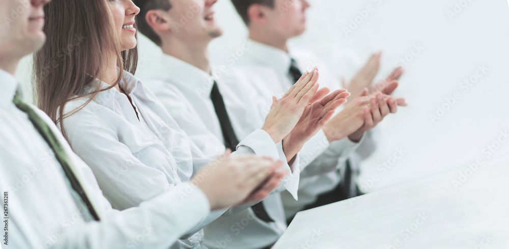 Image of a business team applauding in the sign of approval Image of a business team applauding in the sign of approval