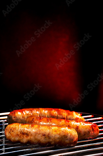 Beautiful grilled sausages on the grill.