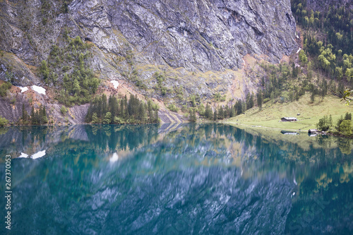 Fototapeta Naklejka Na Ścianę i Meble -  German lodge reflecting in lake obersee