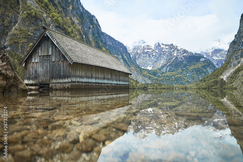 boathouse reflecting in obersee germany © Andreas